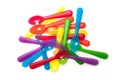 Colorful baby plastic forks stacked on white background Royalty Free Stock Photo
