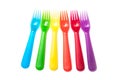 colorful baby plastic forks on white background Royalty Free Stock Photo
