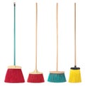 Set of colorful brooms isolated on a white background.