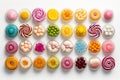 Set of colorful candies in round glass bowls on white background