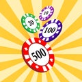 Set of colorful casino chips on a yellow radial background.