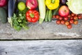 Set of colorful fruits and vegetables on dark wooden background. Royalty Free Stock Photo