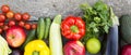 Set of colorful fruits and vegetables on dark wooden surface. Top view. From above. Royalty Free Stock Photo