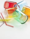 Set of colorful glasses on white background