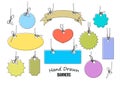 Set of 11 colorful hand drawn labels and banners of various shapes. Vector.