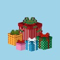 Set of colorful icons of gift boxes. Flat design for Christmas present, love valentine present on blue background. Vector Royalty Free Stock Photo