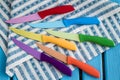 Set of Colorful Kitchen Knives on a Napkin Royalty Free Stock Photo