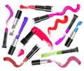 Set of colorful lipsticks with trace on white background