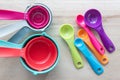 Set of colorful measuring cups and measuring spoons use in cooking.