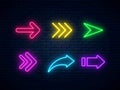 Set of colorful neon arrows, web icons. Neon arrow signs collection. Bright arrow pointer symbols Royalty Free Stock Photo
