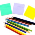 Set of colorful note stickers and pencils on white background Royalty Free Stock Photo