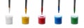 Set of colorful paint brushes and plastic jars Royalty Free Stock Photo