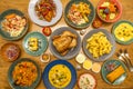 Set of colorful Peruvian gastronomy recipes with Sunday roast chicken, lots of home fries, tamale with red onion, seafood rice, Royalty Free Stock Photo