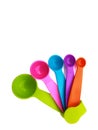 Set of colorful plastic measuring spoons. Royalty Free Stock Photo