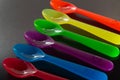 A set of colorful plastic spoons. Royalty Free Stock Photo