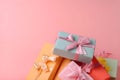 Set of colorful present boxes with silk ribbon on paslet pink background, gift card. Gift or holiday concept. Mothers Day, Royalty Free Stock Photo