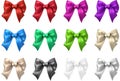 Colorful realistic satin bows isolated on white. Royalty Free Stock Photo