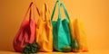 A set of colorful, reusable shopping bags displayed on a bright background, promoting eco-friendliness, concept of