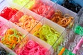 A set of colorful rubber bands and loom knit for knitting wristbands. Close-up, selective focus Royalty Free Stock Photo
