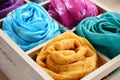 Set of colorful scarfs in wooden box Royalty Free Stock Photo