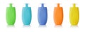 Set of colorful shampoo bottles isolated on white background. Multicolored cosmetic containers of hair conditioner or shower gel.