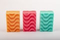 Set of colorful sponges for washing dishes and daily cleaning in the house close up on a white background Royalty Free Stock Photo