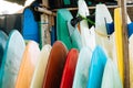 Close up Set of colorful surfboard for rent on the beach. Multicolored surf boards different sizes and colors surfing boards on Royalty Free Stock Photo