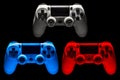 Set of colorful video game joysticks gamepad isolated on a black background Royalty Free Stock Photo