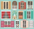 Set of colorful windows with windowsills, curtains, flowers, balconies Royalty Free Stock Photo