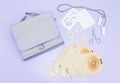 A set of colostomy bag on a lilac background. Royalty Free Stock Photo