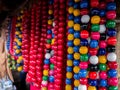 Set of colourful beads on a fence for Mardi Gras,New Orleans, Louisiana, USA.Carnival time collection, craft, creative