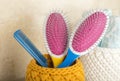 set of combs for hair in a yellow basket in the bathroom. Royalty Free Stock Photo