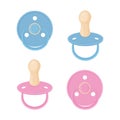 A set consisting of baby pacifiers in blue and pink colors. Collection of nipples.Baby nipples, side view and bottom