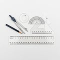 Set consisting of a compass protractor two triangular rulers pencil Royalty Free Stock Photo