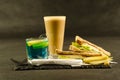 set consisting of two sandwiches malted bread with vintage cheddar cheese, pickles, red onion, tomato, lettuce, blue drink and co Royalty Free Stock Photo