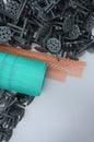 A set of construction items for the insulation of walls. Plastic dowels, a roll of mesh for the insulation of facades and a corne Royalty Free Stock Photo