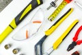 Set of construction tools on white background as wrench, hammer, pliers, socket wrench, spanner, tape measure, electric Royalty Free Stock Photo