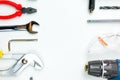 Set of construction tools on white background as wrench, hammer, pliers, socket wrench, spanner, tape measure, electric Royalty Free Stock Photo