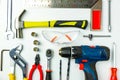 Set of construction tools on white background as wrench, hammer, pliers, socket wrench, spanner, tape measure, electric Royalty Free Stock Photo