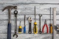 Set of construction tools on the white,rustic wooden background Royalty Free Stock Photo