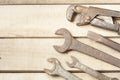 Set of construction tools. Wrench on wooden background Royalty Free Stock Photo