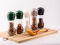 Set for cooking delicious dishes. A mixture of spices in jars. Royalty Free Stock Photo