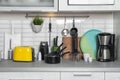 Set of cookware, clean dishes on kitchen counter Royalty Free Stock Photo
