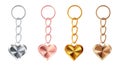 A set of copper, bronze, gold or brass, silver or steel, pink gold keychains in the shape of a heart, isolated on white.