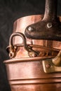 Set of copper pots and pans vertical Royalty Free Stock Photo