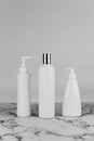 Set of cosmetic bottles, collection bottles of cream with dispenser, shampoo or lotion on white background