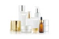 Set of cosmetic containers. Cosmetic product bottles, dispensers, droppers, jars and tubes on white