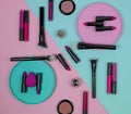 A set of cosmetics for make up, consisting of lipsticks, lip glosses, creams, foundation, blush, powder, highlighter and eye shado
