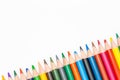 Different colored pencils in different colors with white background for school and arts with copy space for free text Royalty Free Stock Photo