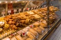 A set of croissants and bread in shop window